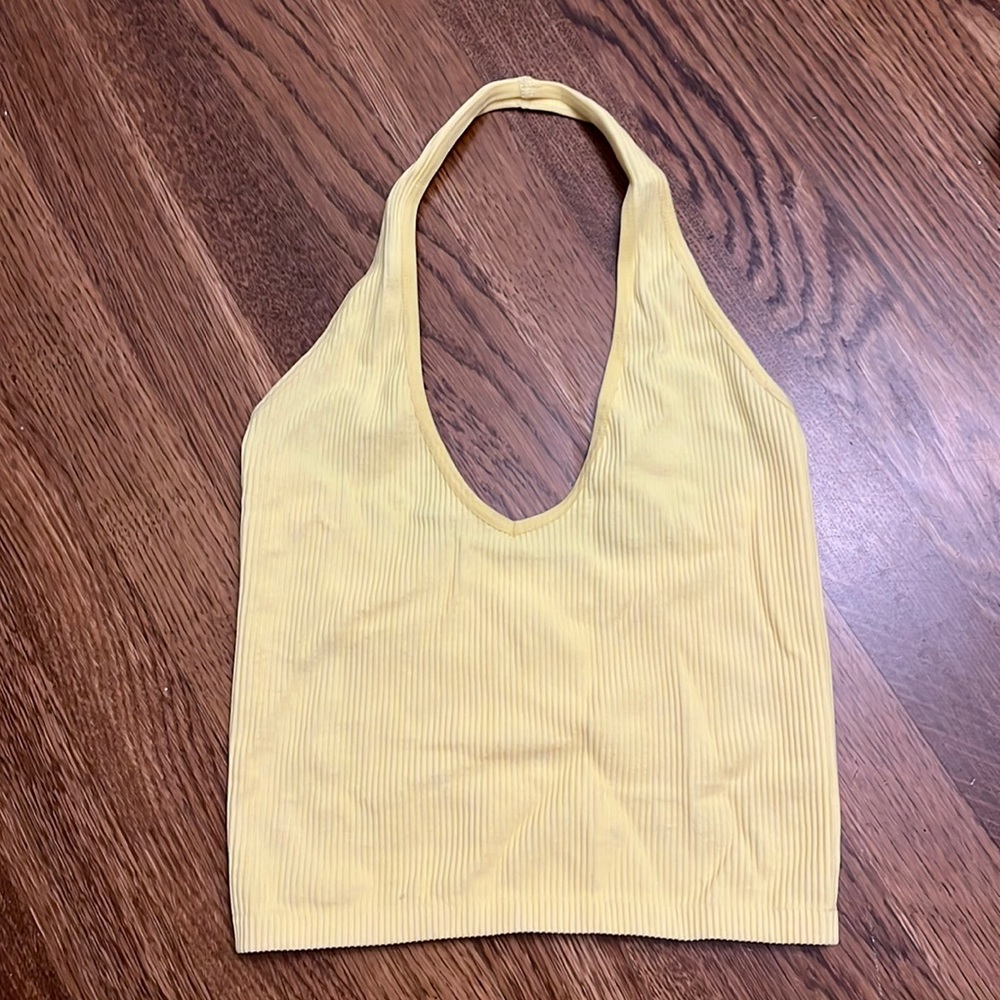Out from under yellow halter